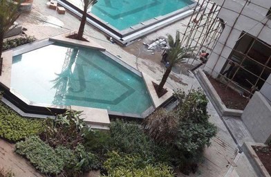 Podium water feature and landscaping