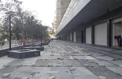 Paved podium promenade under execution